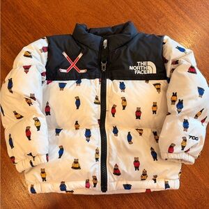The North Face White and Black Puffer Jacket with Bear Print